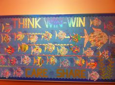 a bulletin board with fish on it and words that say think wn - win