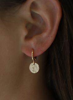 The Petite Coin Huggie Earrings are one of our best sellers! Styled in your first or second piercing, these huggies are a timeless piece that will match with anything else you add to your ear stack. Materials: Gold plated Length: Earring is about 3/4 of an inch, coin is 1 mm SKU: E1366 Materials + Care Permanent Bracelet, Teal Jewelry, Bachelorette Party Dress, Huggie Earrings Gold, Second Piercing, Coin Earrings, Ear Stack, Gold Coin, Huggie Earrings