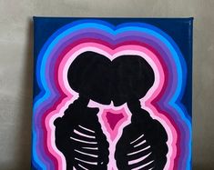 a painting of two people kissing in front of a blue background with pink, purple and blue swirls