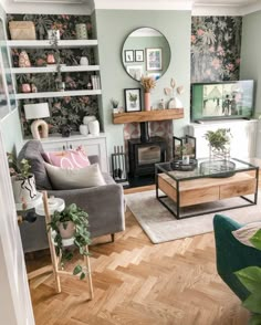 a living room filled with furniture and a fire place