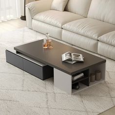 a coffee table sitting on top of a white rug