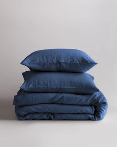 three pillows stacked on top of each other