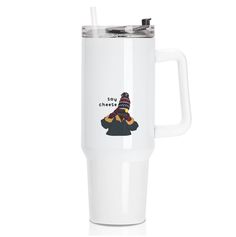 a white travel mug with an image of a person wearing a hat and scarf on it