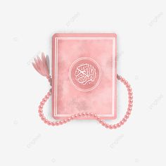 a pink book with a tassel on the end and a string attached to it