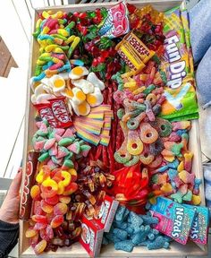 a box filled with lots of different flavored candy