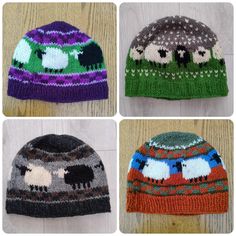 four different knitted hats with sheeps on them, one is green and the other is purple