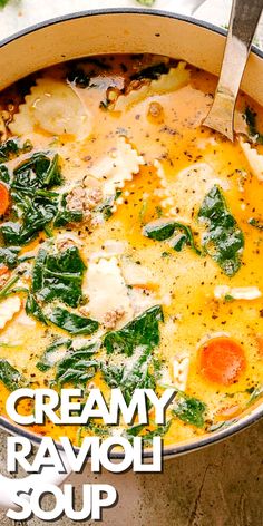 creamy ravioli soup with spinach and carrots in a large pot on the table