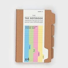 the tab notebook is lined with colored paper