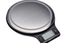 an electronic scale is shown on a white background