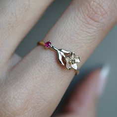 Our special collection of birth flower rings are inspired by the love of wearing something meaningful. Each birth flower is adorned with that month's birthstone. July's birth flower is Water Lily and the birthstone is ruby. Materials: 14K solid gold 2mm natural ruby 1.1mm band thickness ** This item is specially made for you. Please allow 1-2 week lead time. Shipping:Domestic: Free standard shipping within the U.S.International: Free standard shipping for orders over $200 Customization:- Interes July Water Lily, July Birth Flower, Lily Ring, Lotus Flower Ring, July Birthstone Ring, Birthstones By Month, Flower Rings, Rose Ring, Lily Rose