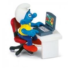 the smurf is working on his laptop