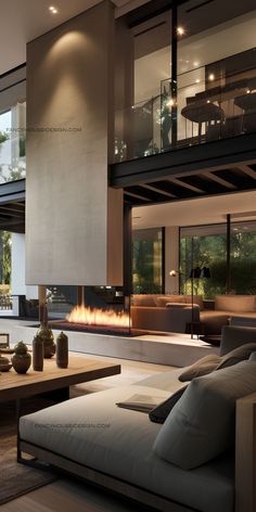 a living room with couches and a fire place in the middle of the room