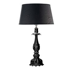 a black lamp on a white background with a black lampshade in the corner