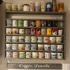 a shelf filled with lots of coffee cups