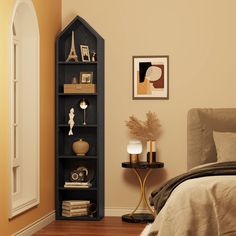 a bed room with a neatly made bed and a book shelf on the wall next to it