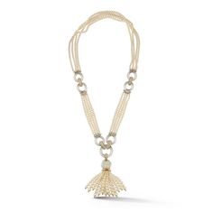 Cartier Rock Crystal and Pearl Tassel Necklace A sautoir necklace with four rows of cultured pearls embellished with rock crystal links and round cut diamonds. Signed: Cartier Paris and numbered Features maker's marks for Georges Lenfant and French assay marks Approximate total diamond weight: 7.00 carats Approximate Length: 26.77" Approximate Weight: 170 grams Metal type: 18-karat yellow gold Luxury Cartier Necklace, Luxury Cartier Necklaces For Evening, Luxury Cartier Fine Jewelry Necklaces, Classic Cartier Luxury Necklaces, Cartier Tassel Necklace, Luxury Hallmarked Cartier Necklace, Vintage Cartier Watch, Long Pendant, Jade Carving