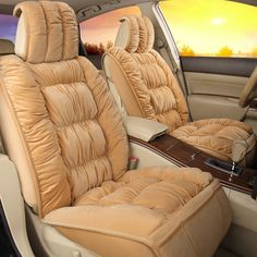 the interior of a car with beige leather seats