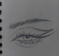 a drawing of an eye with long eyelashes