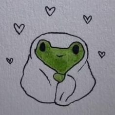 a drawing of a frog wrapped in a blanket with hearts around it's eyes