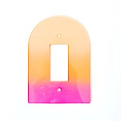 a pink and yellow light switch plate cover