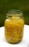 a jar filled with food sitting on top of a table