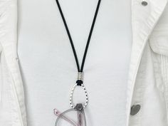 Save that annoying hunt for your glasses and prevent your expensive sunglasses from being lost! This versatile glasses holder necklace is also wonderful as a necklace alone.  An oval shape silver-plated open loop is the focal point of this charming eyeglass holder necklace. A beautifully detailed Bail-style Tibetan silver bead holds the pendant securely. Your glasses are held vertically, ready when you need them.  This is a fashionable, stylish way to always have your glasses handy! This versatile, go-with-everything eyeglass chain features a comfortable high-quality vegan suede black cord. There is an antiqued silver-plated lobster claw clasp in the back with silverplated end caps for the cord. Choose your around-the-neck cord length from the dropdown menu considering the versatile OVAL R Trendy Everyday Glass Necklaces, Glasses Holder Necklace, Expensive Sunglasses, Eyeglass Holder Necklace, Sunglasses Holder, Silver Sunglasses, Glasses Holder, Sunglass Holder, Eyeglass Holder