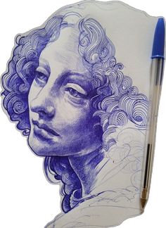 a drawing of a man's face with curly hair and blue ink on paper