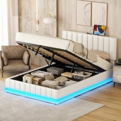 a bed that is sitting on top of a hard wood floor in a living room