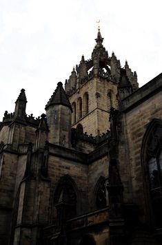 an old building with a clock tower on top