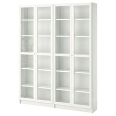 a white bookcase with three shelves on the front and two doors on the back