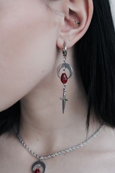 Channel the magic of Blood Moon.    ★ Hand-crafted to order. ★  Waterproof & tarnish proof ★ Comes as a symmetrical pair. ★ 3 Earring Types Available: Stainless Steel Studs, Stainless Steel Hoops, and Stainless Steel Clip-Ons. ★ Fully stainless steel. Gothic Streetwear Jewelry, Gothic Pierced Jewelry For Streetwear, Blood Moon, Vampire Slayer, Gothic Style, Matching Necklaces, Style Jewelry, Gothic Fashion, Jewelry Earrings Dangle