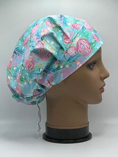 the head of a mannequin wearing a scrub hat