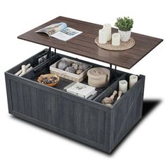 a coffee table with storage underneath it and candles on the top, in front of a white background