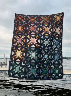 a quilt pattern by kate zam on the cover of astra