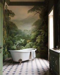 a bathroom with a tub, sink and wall mural