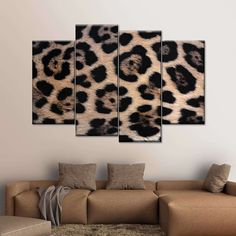 a leopard print wall hanging in a living room