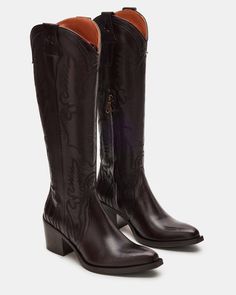 Expertly crafted for Western-style and durability, our SALOON boots feature a pointed toe, knee-high silhouette, and whipstitching detailing. The sturdy block heel with a star detail adds a touch of unique charm while providing comfortable support. Elevate your wardrobe with these timeless, versatile boots. 2.5 inch he Tall Pointed Toe Boots, Dark Brown Cowboy Boots, Tall Cowboy Boots, Knee High Western Boots, Western Casual, Brown Cowboy Boots, Urban Cowboy, Dream Outfits, Western Boots Women