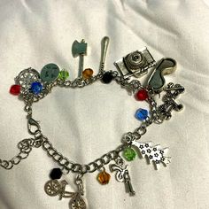 Charm Bracelet. Stranger Things Themed. Never Worn Stranger Things Jewelry, Womens Jewelry Bracelets, Stranger Things, Charm Bracelet, Women Jewelry, Bracelet, Silver, Women Shopping, Quick Saves