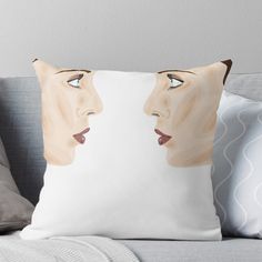 a woman's face is shown on a pillow