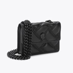 The Micro Kensington is crafted from a faux lambskin leather with signature parquet padded overstitch quilt with three rows of weave pattern. The black egle head features crystals and black bead eyes on the front flap. 2.8in (H), 3.9in (L), 0.8in (D)Strap drop cross body: 48.4inBlack metal chain strapMagnetic snap closure hidden under flapBlack metal branded plate on the backCan fit classic credit cardsOuter: Faux leatherInterior: Monogrammed interior liningStyle number: 9548600999 Outfits Gorditas, Hand Bags For Women, Micro Bags, Pretty Shoes Sneakers, Baggage Claim