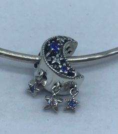 THIS LISTING IS FOR ONE PANDORA CHARM, AS SEEN IN THE PHOTOS. IT COMES IN A PANDORA JEWELRY POUCH.  DISPLAY ITEMS ARE NOT INCLUDED. ALL ITEMS ARE STERLING SILVER AND HAVE THE S925 ALE HALLMARK. IF THIS IS A GIFT, PLEASE MARK YOUR ITEM AS GIFT WHEN YOU CHECK OUT AND WE WILL INCLUDE A GIFT BOX (WHILE SUPPLIES LAST). PHOTOS SHOWN ARE OUR PHOTOS.  HOWEVER SOMETIMES PANDORA STOCK PHOTOS ARE USED TO SHOW DETAILS. WE ARE UNABLE TO TAKE ADDITIONAL PHOTOS, UNLESS WE HAVE MISSED SHOWING THE HALLMARK. IF Y Pandora Star, Charms Pandora, Pandora Charm, Moon Charm, Mail Letters, Pandora Jewelry, Jewelry Pouch, Pandora Charms, Crescent Moon