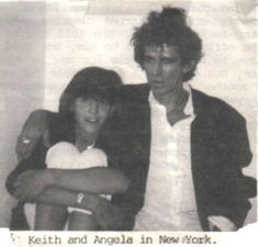 an old black and white photo of two people