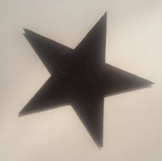 a black and white photo of a star