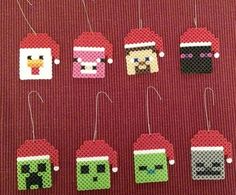 cross stitch christmas ornament ornaments on a red background