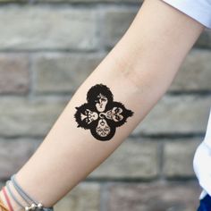 a person with a tattoo on their arm