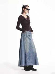 MO&Co. Women's A-line Maxi Denim Skirt This denim skirt is expertly crafted from comfortable cotton, offering a lightly faded blue wash and raw hem for a trendy touch. Its A-line maxi silhouette adds a flattering and versatile option to any wardrobe. Pair with our knit cardigan for a stylish look. Features : - High waist A-line maxi silhouette- Seams detail and raw hem- Zip fly, Side pockets Code: MBD3SKT027The back length of size S is 91.5cmMATERIALS & CARE Material: 100% CottonPlease put it in Maxi Denim Skirt, Denim Skirt Outfits, Trendy Denim, Denim Trends, Denim Maxi Skirt, Knitted Cardigan, Skirt Outfits, Long Skirt, Knit Cardigan