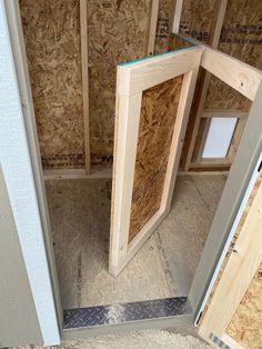 the inside of a house being built with plywood