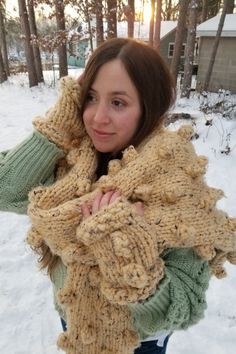 Whimsical oversized bobble scarf knitting pattern. Blanket scarf knitting pattern. This is a fun project made with super bulky yarn. It knits up fast on large-sized needles. Matching fingerless glove pattern is included in one size. Techniques used include knitting, purling, and making bobbles. Fringe can be applied as well. Designed to keep you warm and cozy this winter!

#womensoversizedscarfknittingpattern #indieknits #giftforher #blanketscarfknittingpattern #bobbleknitting #handmade #DIY Fingerless Glove Pattern, Fingerless Gloves Knitted Pattern, Scarf Knitting Pattern, Glove Pattern, Gloves Pattern, Scarf Knitting, Super Bulky Yarn, Scarf Women Fashion, Winter Boho