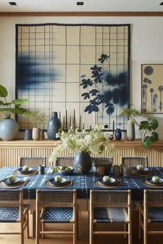 a dining room table with blue and white decor