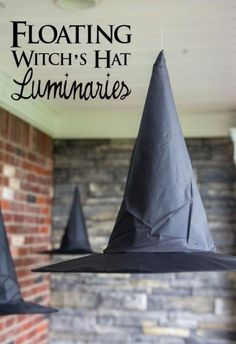 witches hat luminaries hanging from the ceiling